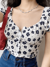 Blusa corta de manga corta con estampado floral